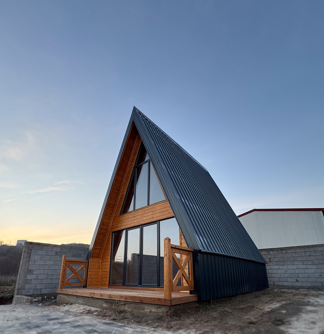 A-frame cabin at dusk