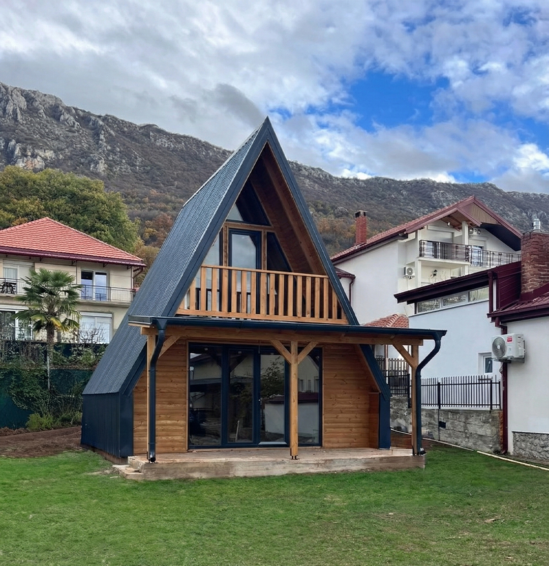 A-frame with balcony in mountain village
